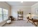Bright office with carpet, neutral walls, desk, and chair at 4249 Caveat Ct, Fairburn, GA 30213