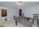This game room features a foosball table and access to a full bathroom, perfect for recreation and convenience at 149 Crown Glen Way, Stockbridge, GA 30281