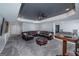 Spacious living room featuring a large sectional sofa and a TV at 149 Crown Glen Way, Stockbridge, GA 30281