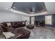 Spacious living room featuring a large sectional sofa and a TV at 149 Crown Glen Way, Stockbridge, GA 30281
