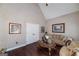 Cozy living room showcasing neutral paint, crown molding and an accent wall with artwork at 149 Crown Glen Way, Stockbridge, GA 30281