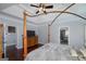 Spacious primary suite with a bed, a tv, and access to a luxurious en-suite bathroom at 149 Crown Glen Way, Stockbridge, GA 30281