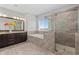 Modern bathroom with granite countertops, double sinks, soaking tub, and glass walk-in shower at 326 Still Pine Bnd, Smyrna, GA 30082