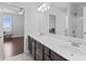 This bathroom has double sinks, lots of light and a separate shower/tub at 326 Still Pine Bnd, Smyrna, GA 30082