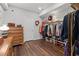 Spacious walk-in closet with custom shelving and drawers at 326 Still Pine Bnd, Smyrna, GA 30082