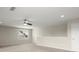 Bright and airy bonus room with carpet flooring, a ceiling fan, and natural light at 4452 Thach Ave, Sugar Hill, GA 30518