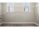 Functional closet featuring wire shelving, carpet flooring, and a window for natural light at 4452 Thach Ave, Sugar Hill, GA 30518