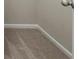 This is a walk-in closet with carpet floors, light colored walls, and white trim at 4452 Thach Ave, Sugar Hill, GA 30518