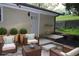 Backyard patio with cozy seating arrangement, ideal for outdoor relaxation and entertaining guests at 2926 Monterey Dr, Decatur, GA 30032