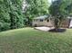 Lush backyard featuring a patio area perfect for outdoor entertaining and a private setting at 2926 Monterey Dr, Decatur, GA 30032