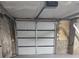 Clean, functional garage featuring a new white door for secure parking and easy access at 2926 Monterey Dr, Decatur, GA 30032