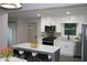 Stylish kitchen with updated appliances, white countertops, and a gray-blue island at 2926 Monterey Dr, Decatur, GA 30032