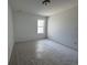 This bedroom is bright with fresh white paint at 1115 Lockhart Way, Douglasville, GA 30135