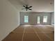 Spacious living room with natural light and door to the outside at 1115 Lockhart Way, Douglasville, GA 30135