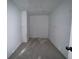 Unfinished, storage room with access door at 1115 Lockhart Way, Douglasville, GA 30135