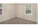 Cozy bedroom with neutral walls and plush carpet, creating a serene and inviting atmosphere at 2191 Greystone Way, Decatur, GA 30032