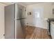 Kitchen showcases stainless steel appliances, wood floor and a functional layout at 2191 Greystone Way, Decatur, GA 30032