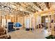 Unfinished basement, featuring framing and insulation, ready for customization at 275 Cedars, Villa Rica, GA 30180
