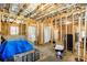 Unfinished basement, showcasing framing, insulation, and potential for customization at 275 Cedars, Villa Rica, GA 30180