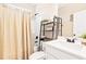 Bathroom with a shower-tub, a modern vanity, and updated fixtures at 275 Cedars, Villa Rica, GA 30180