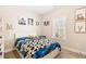 Cozy bedroom with colorful decor and a large window that brightens the room at 275 Cedars, Villa Rica, GA 30180