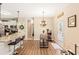 Open kitchen with granite countertops, stainless appliances, and a view to the backyard at 275 Cedars, Villa Rica, GA 30180