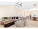 Bright and airy living room showcasing a sectional sofa and hardwood floors at 275 Cedars, Villa Rica, GA 30180