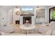 Comfortable living room with a fireplace, stylish furnishings, and contemporary decor accents at 104 Trinity Hollow Dr, Canton, GA 30115