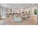 Open concept living room connecting the kitchen and dining area, with bright natural light and ample space at 104 Trinity Hollow Dr, Canton, GA 30115