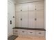 Mudroom features custom cabinetry with drawers and bench seating at 104 Trinity Hollow Dr, Canton, GA 30115