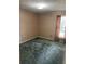 A simple bedroom featuring a window with curtains and patterned wallpaper at 512 Rockborough Ter, Stone Mountain, GA 30083