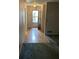 View of the foyer featuring a hardwood floor leading to the front door at 512 Rockborough Ter, Stone Mountain, GA 30083