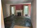 Spacious living room featuring a fireplace, carpeted floor, and natural light at 512 Rockborough Ter, Stone Mountain, GA 30083