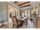 Beautiful dining room with chandelier, wood beam ceiling, and stylish decor at 829 Big Horn Holw, Suwanee, GA 30024