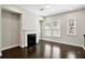 Living room with a fireplace and natural light at 1829 Hislop Ln, Atlanta, GA 30345