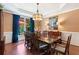 Formal dining room showcasing beautiful wood furniture and a view to the outdoors at 3820 Ridge Point Dr, Suwanee, GA 30024