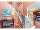 Welcoming foyer with staircase and decorative accents at 3820 Ridge Point Dr, Suwanee, GA 30024