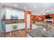 Well-lit kitchen featuring granite counters, stainless steel appliances, and an open design at 3820 Ridge Point Dr, Suwanee, GA 30024