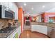 Well-equipped kitchen with granite countertops and modern stainless steel appliances at 3820 Ridge Point Dr, Suwanee, GA 30024