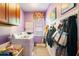 Functional laundry room with modern appliances and storage at 3820 Ridge Point Dr, Suwanee, GA 30024