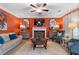 Spacious living room featuring a fireplace, television, and comfortable seating at 3820 Ridge Point Dr, Suwanee, GA 30024