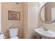 Charming powder room with decorative wallpaper and a stylish sink at 3820 Ridge Point Dr, Suwanee, GA 30024