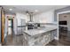 Modern kitchen featuring stainless steel appliances, granite countertops, and a center island at 675 Mayes, Powder Springs, GA 30127
