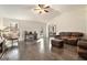 Bright and airy living room featuring hardwood floors, neutral walls, and stylish furniture at 675 Mayes, Powder Springs, GA 30127