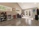Bright living room with wood floors, a vaulted ceiling, and French doors to the outside at 675 Mayes, Powder Springs, GA 30127