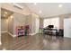 Spacious room featuring wood floors, natural light, and space for study, play, and storage at 675 Mayes, Powder Springs, GA 30127
