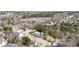 An aerial view showcasing the neighborhood with the pool in the distance at 949 Tumlin Trce, Lawrenceville, GA 30045