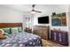 Bedroom featuring a ceiling fan, luxury vinyl plank flooring, natural light and nice furniture at 949 Tumlin Trce, Lawrenceville, GA 30045