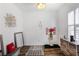 Bonus room with luxury vinyl plank flooring, a window with shutters, and an art decor at 949 Tumlin Trce, Lawrenceville, GA 30045