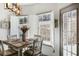 Comfortable dining area features bright lighting and great natural light, perfect for Gathering meals at 949 Tumlin Trce, Lawrenceville, GA 30045